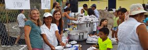 Serving Meals at One Year Commemoration of Earthquake